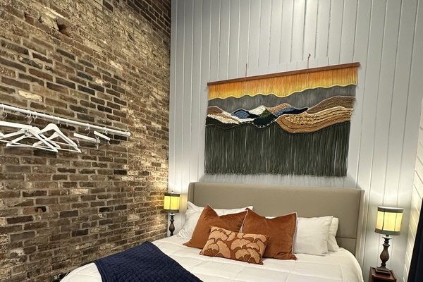 The Boho Room. Comfy King bed and pull out futon in the sitting area.