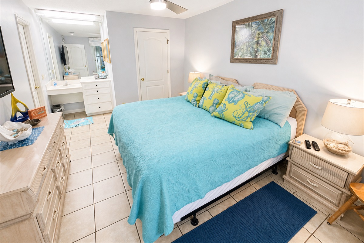 Master bedroom with a king bed and flatscreen TV