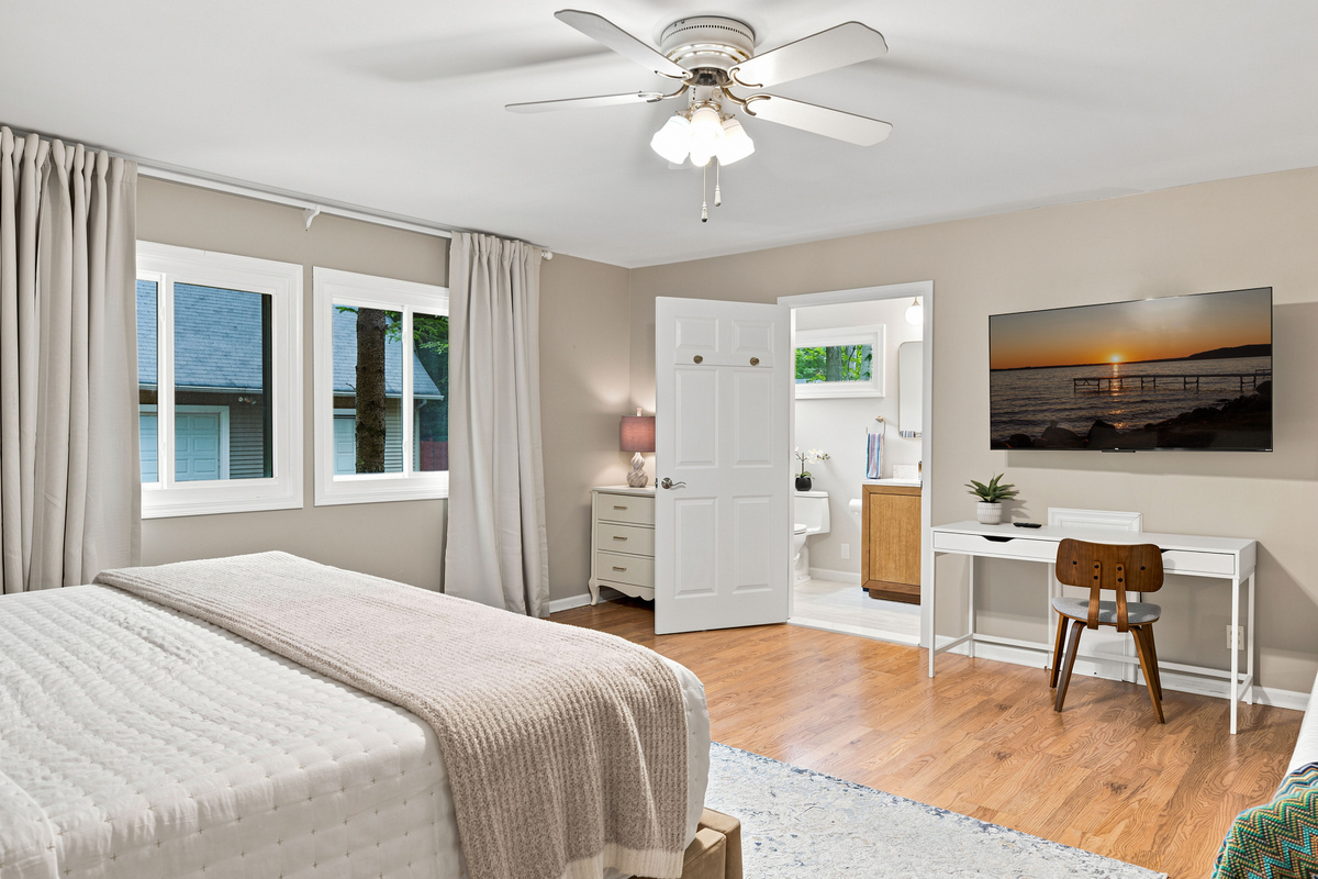 The primary bedroom is spacious enough for the whole family! The king bed is amazing with a new Zinus memory foam mattress, and the trundle bed can allow two small kiddos to camp out with Mom and Dad. There is also a pack'n play for the little ones!