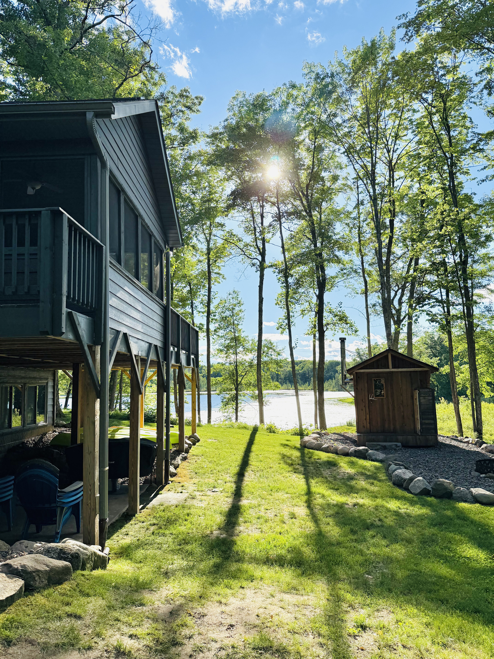 Our authentic wood burning sauna with a great view of the lake.