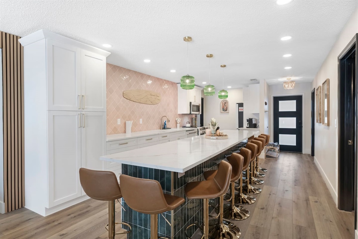 Massive Open Kitchen with 15-foot Quartz Island (seating for 12), Luxury GE Cafe Appliances. Fully stocked for large group, Games, Open to Living Room 
