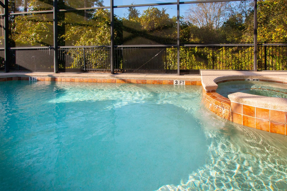 Private Screened Patio Pool with connecting Hot Tub.