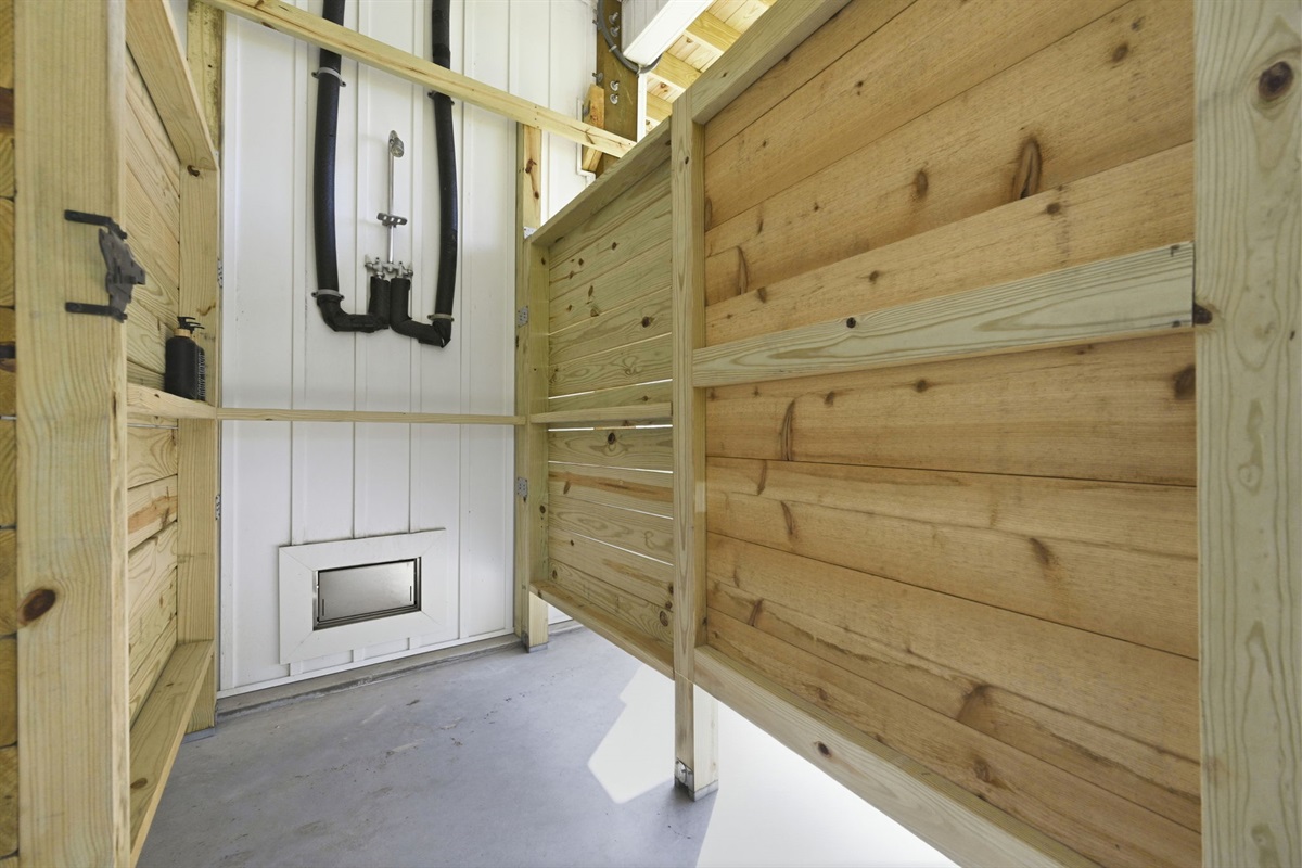 Convenient outdoor shower area to rinse off after beach days and adventures