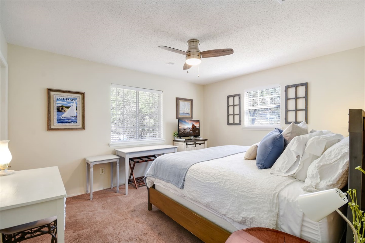 Queen Bed in Primary Bedroom with en suite bath and HDTV