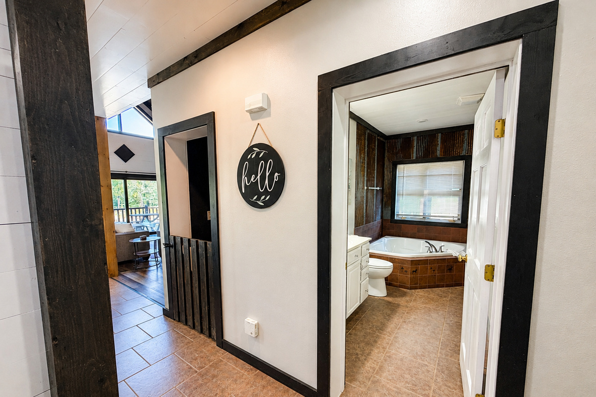 Back downstairs, the basement steps have kid safety door. It is located right off the kitchen.
