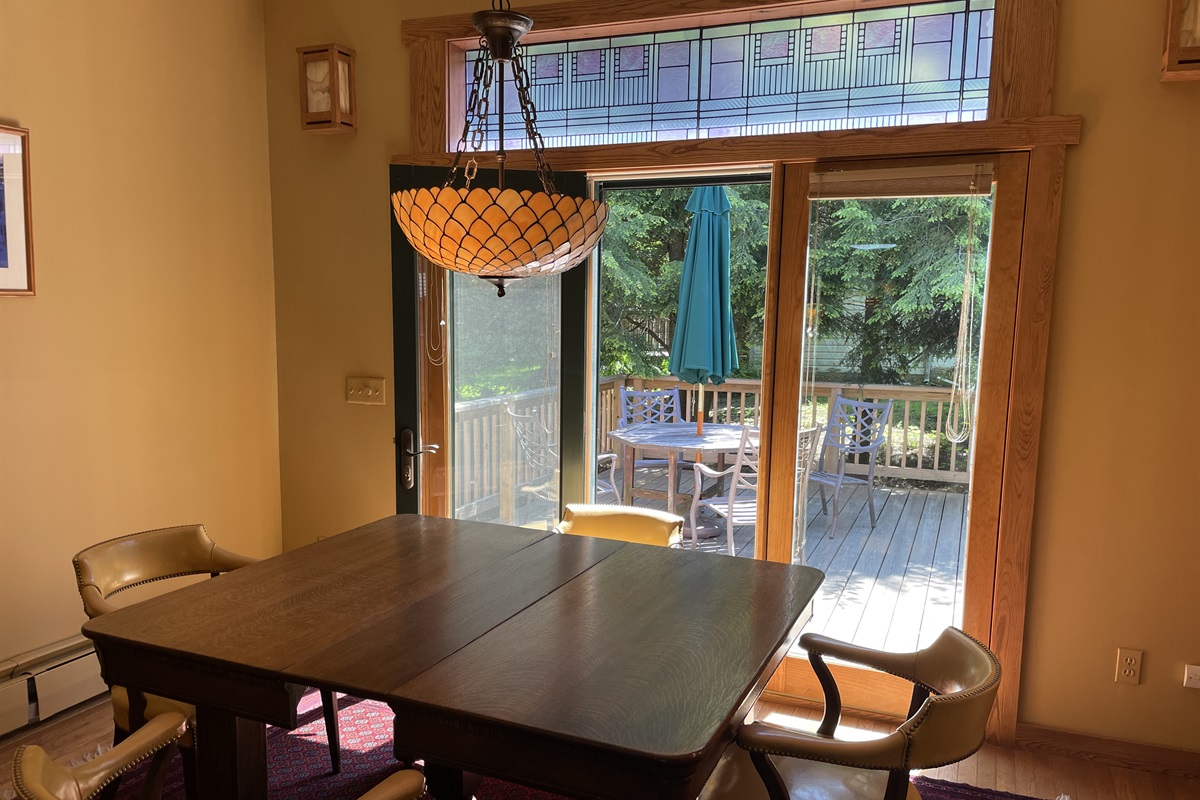 Dining Area with doors leading to the side porch.