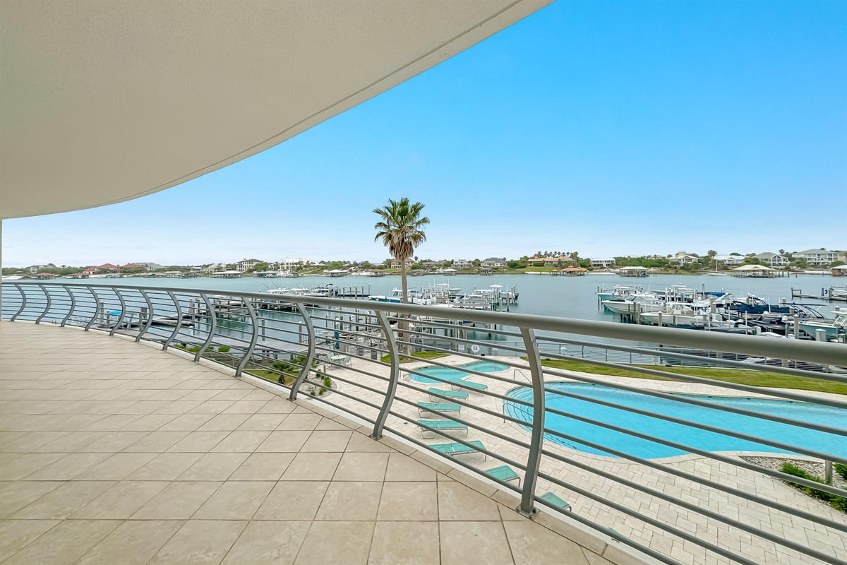 Unwind on this expansive balcony and soak in panoramic water views. A perfect retreat for relaxation and enjoying the coastal breeze.
