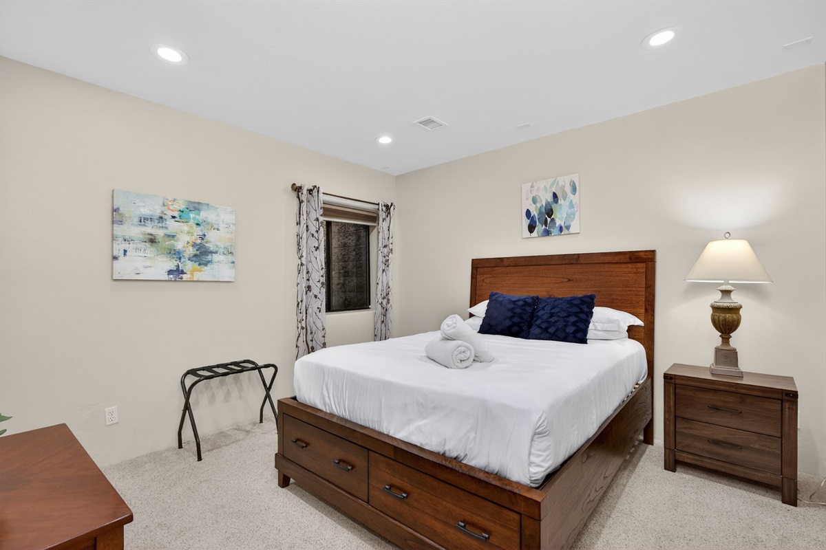 Additional basement bedroom with double bed provides extra flexibility for larger groups