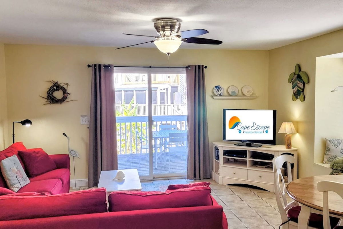 Your group lands here after the beach &mdash; sink into the sofa, flip on the Smart TV, and let the day slow down around you.