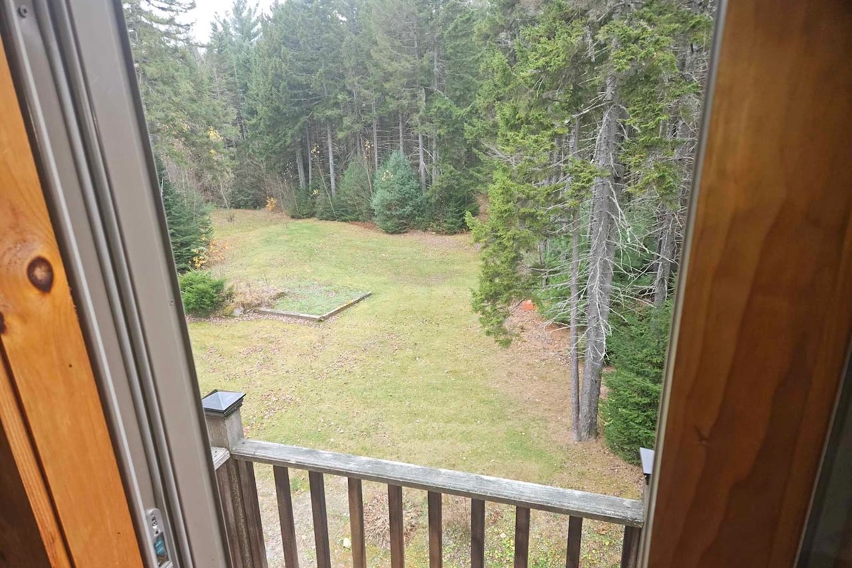 Enjoy the view from the private deck attached to the main bedroom of the home!