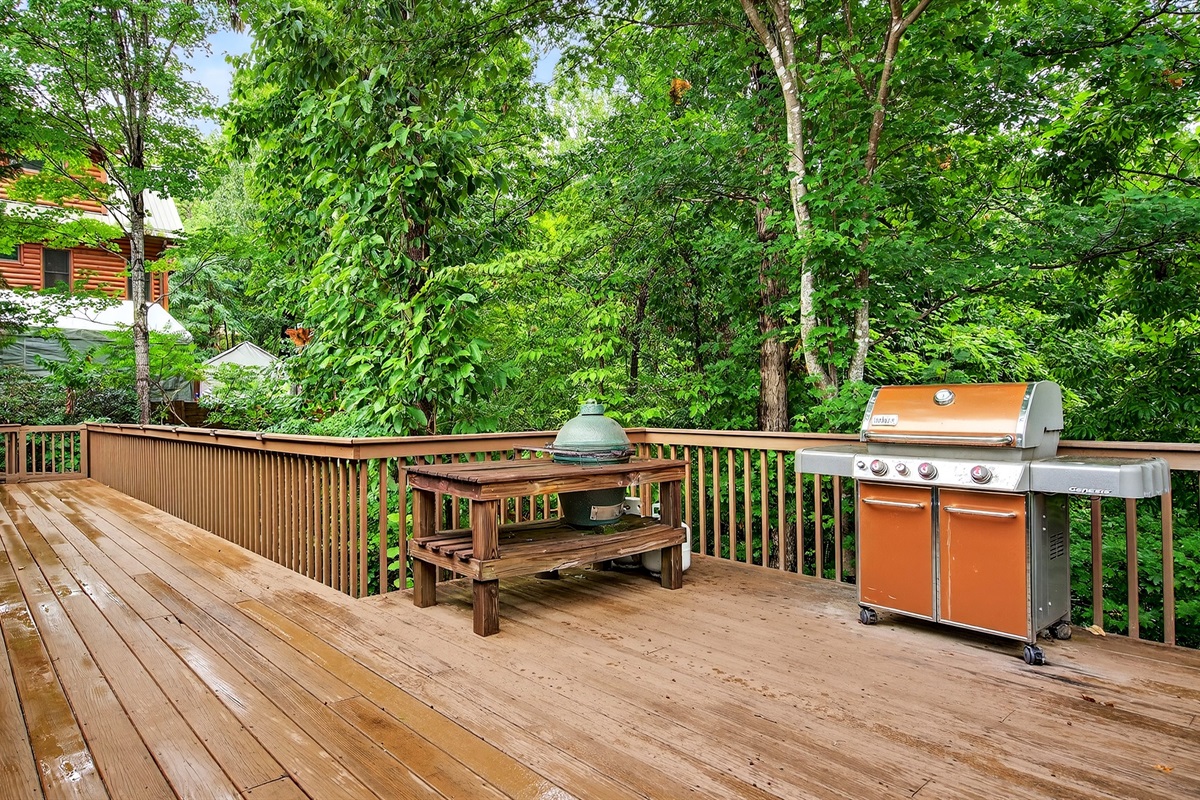Large propane grill located on the deck
