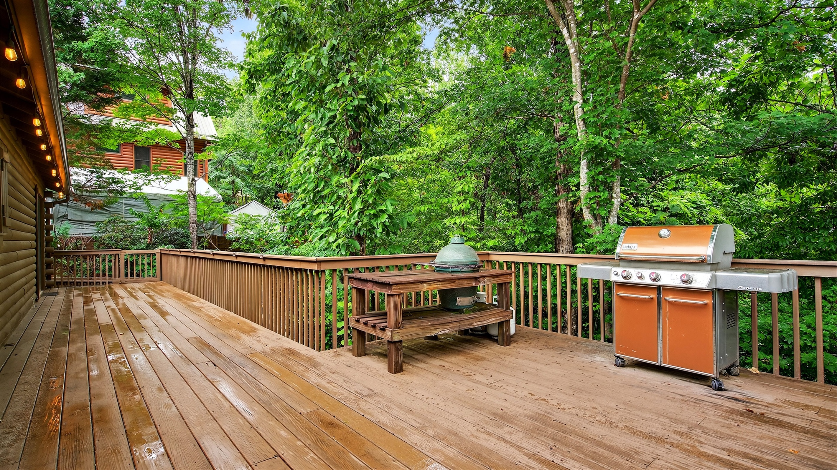 Large propane grill located on the deck