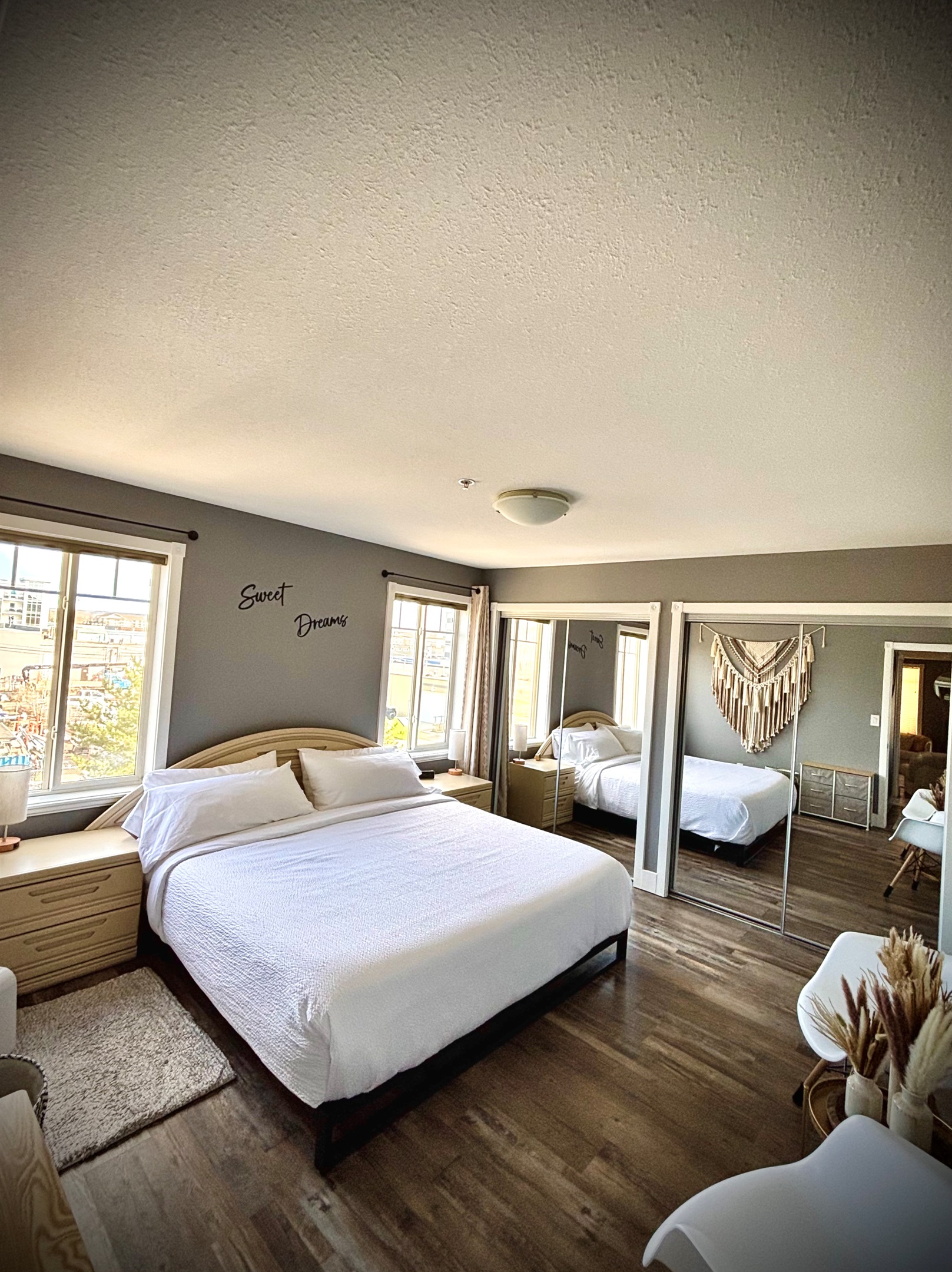 Master bedroom with a king-size bed