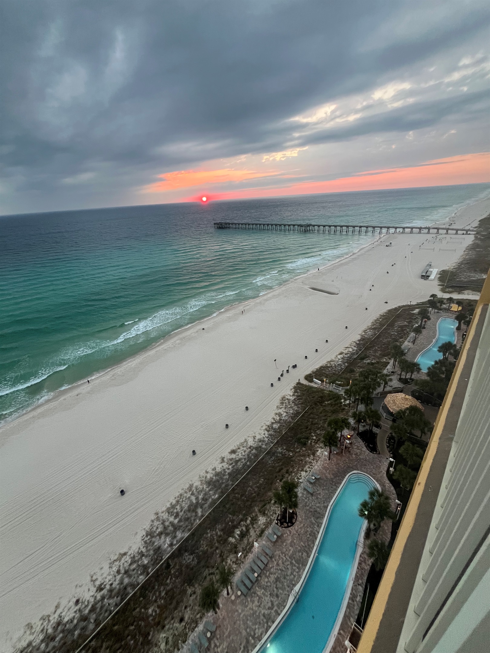 An aerial view of paradise—soak up the sun by the massive beachfront pools!