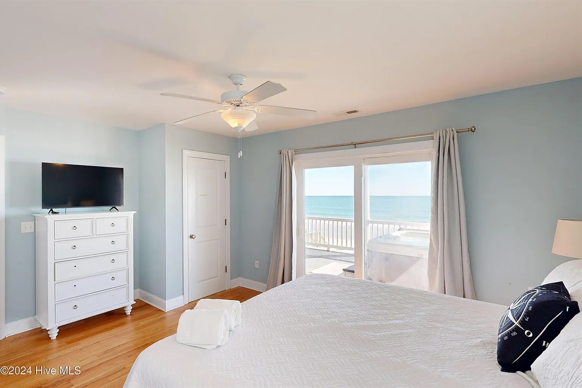 Bedroom with slider to main deck