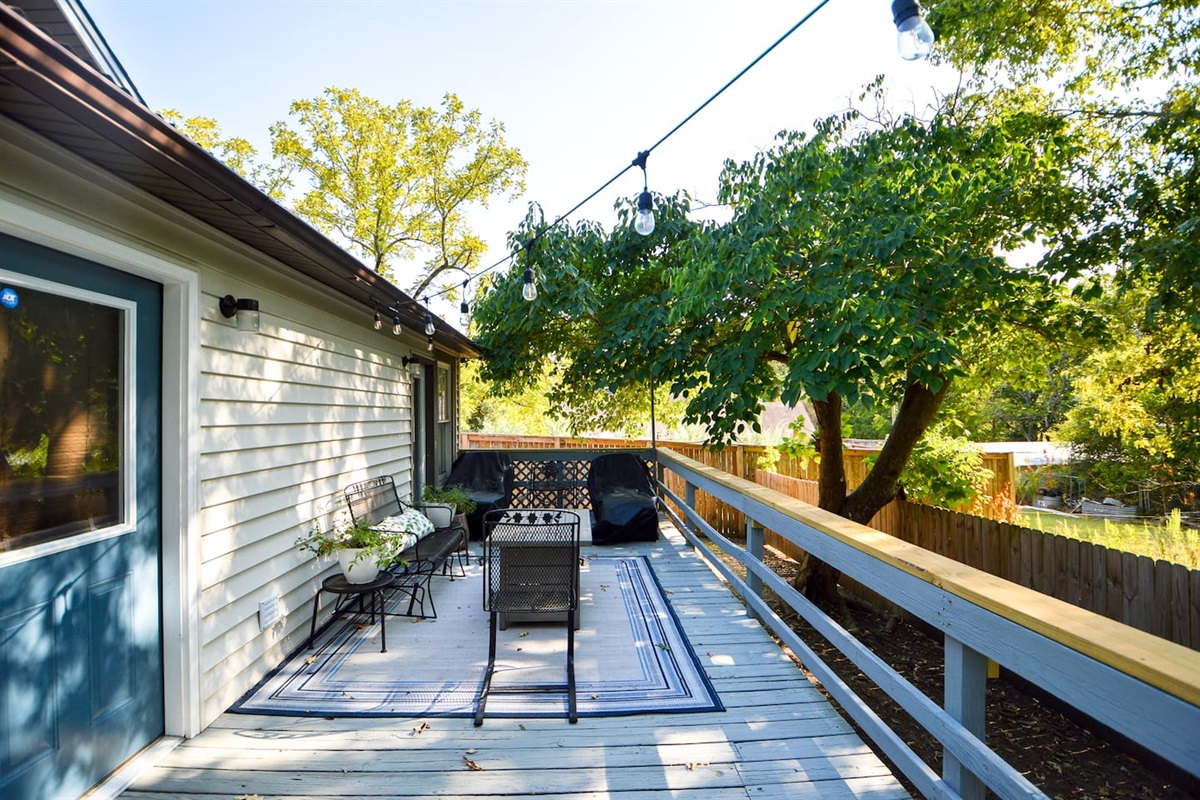 Back Patio with firepit and string lighting