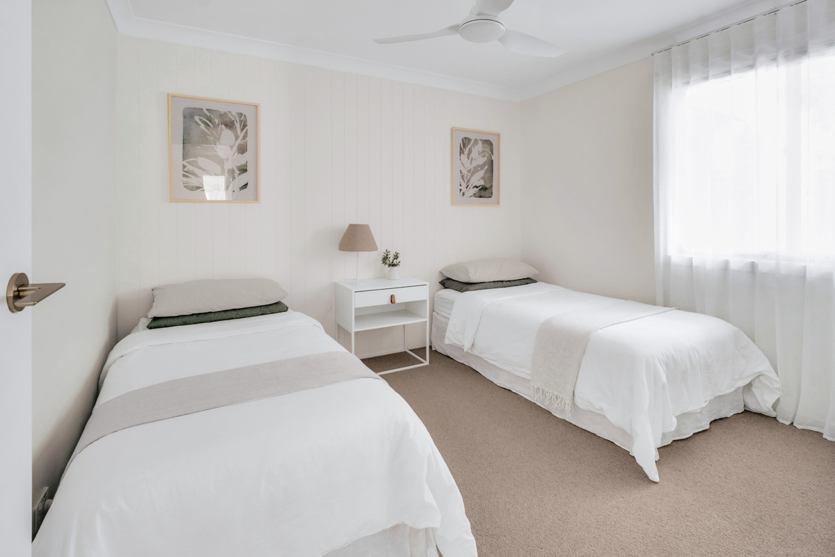 Comfortable twin sleeping arrangements make this room a great option for families or groups.