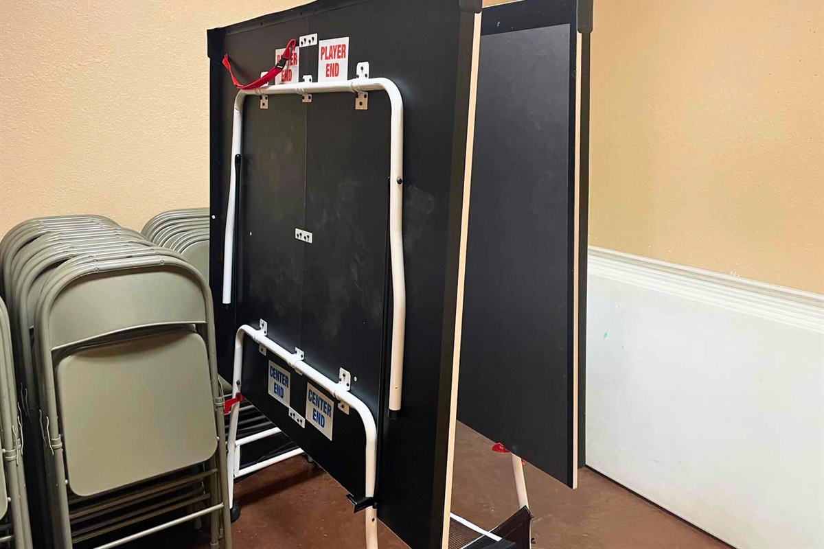 Game tables and chairs ready for fun nights.