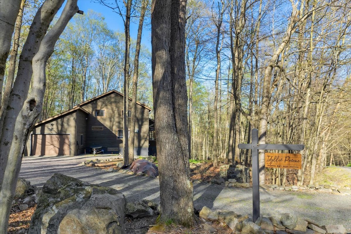 “Welcome to The Idyllic Pocono — your forest escape begins here.”