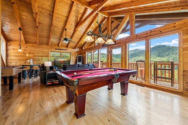 Game-packed loft with soaring ceilings, mountain views, and room to unwind.