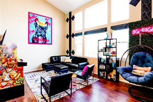 Family Time Headquarters  – Create cherished memories in our living room, complete with comfy couches.