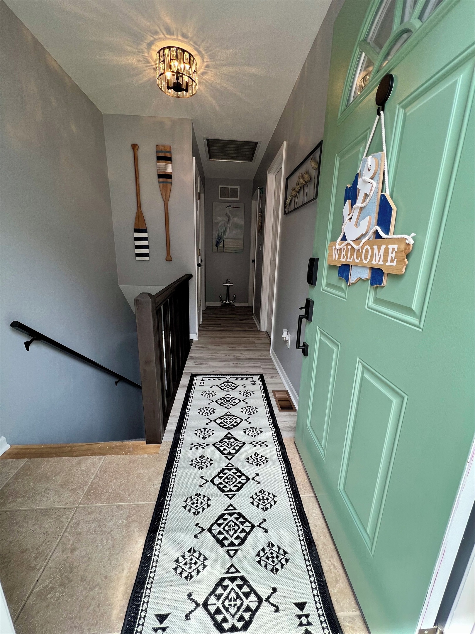 Entryway leading to bedrooms upstairs.