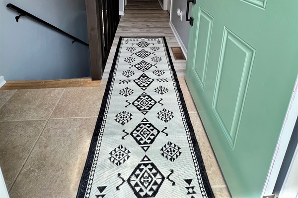 Entryway leading to bedrooms upstairs.