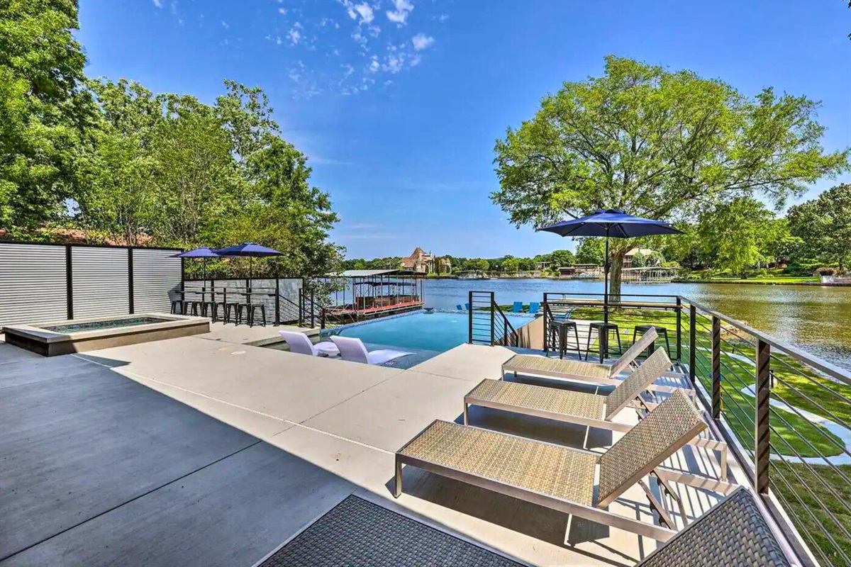 [Pool Area] Head Outside and Sun Bathe on One of the Many Lounge Chairs or Couches Outside.