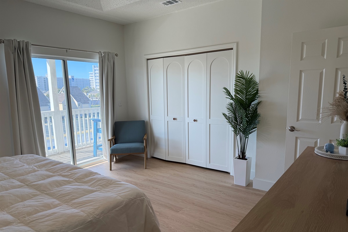 Our master bedroom with a view out of the sliding glass doors. 