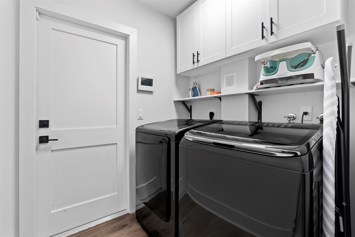 Convenient in-home laundry with full-size washer and dryer makes extended stays effortless and stress-free.