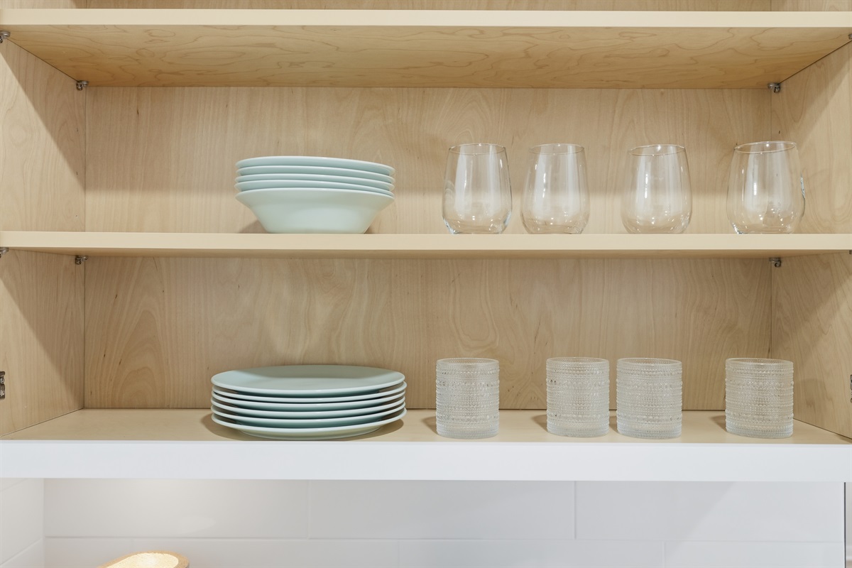 Elegant crocery set all set for plate full meal.. with water on rocks..