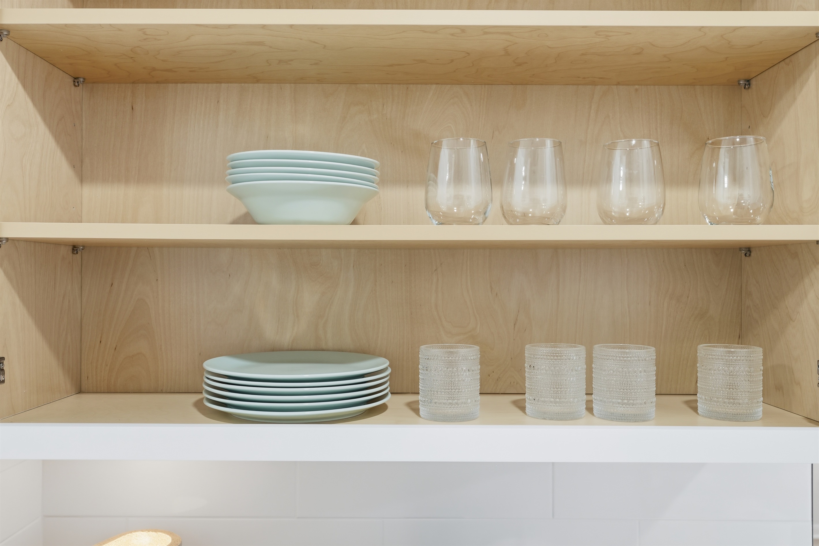 Elegant crocery set all set for plate full meal.. with water on rocks..