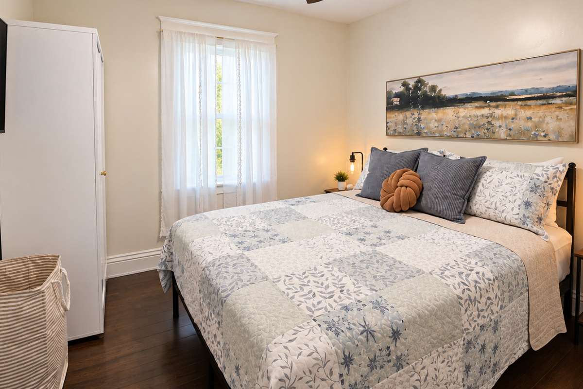 Bright, comfortable second queen bedroom with its own Smart TV.