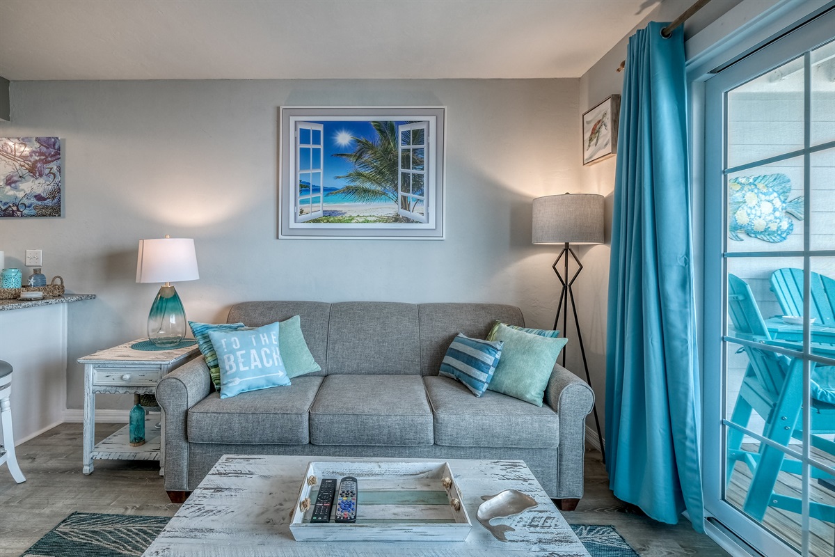 Living space has a queen sofa bed