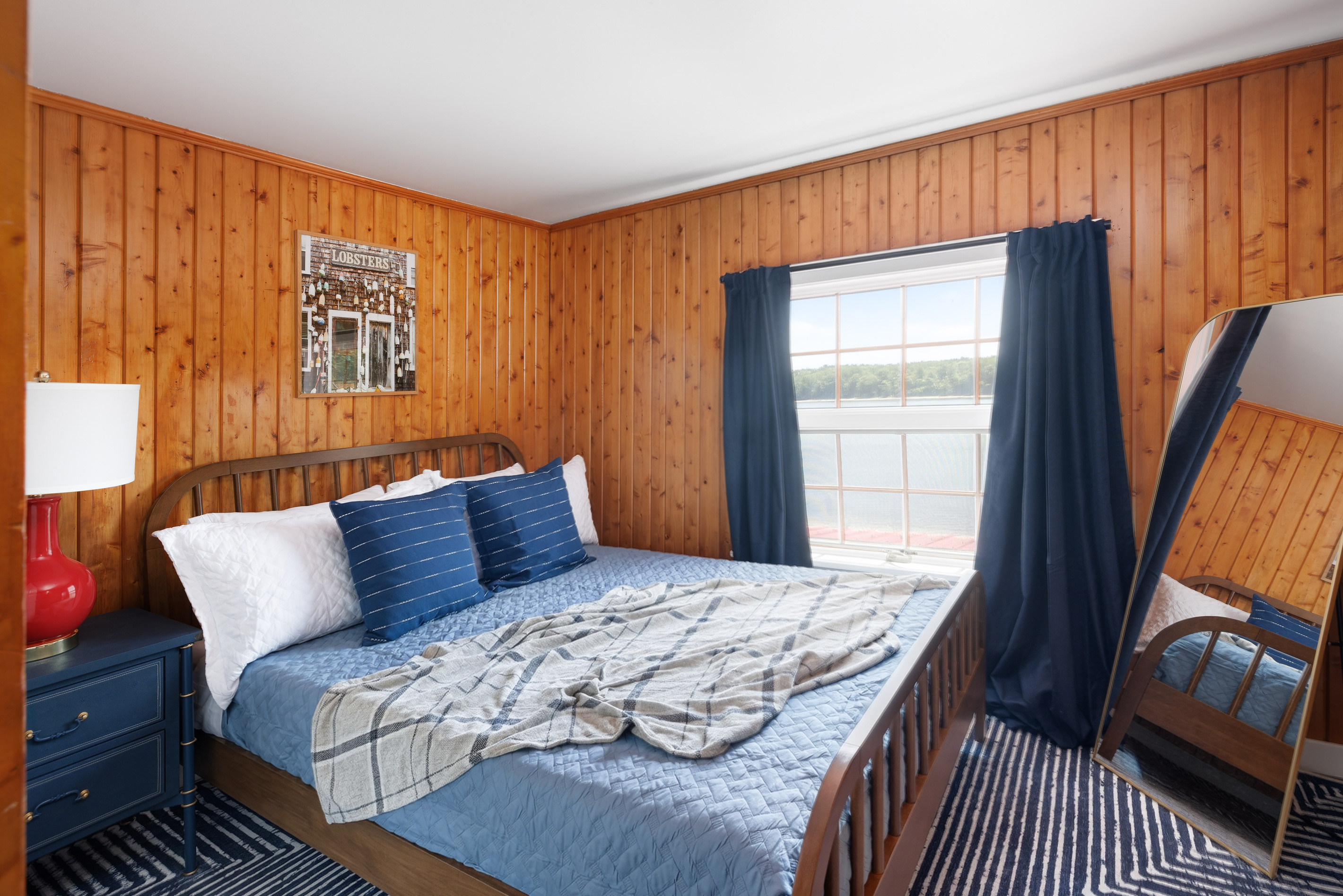 Your second bedroom gives everyone their own queen-size space — well-lit, clean, exactly the right size for two people who want to sleep well.