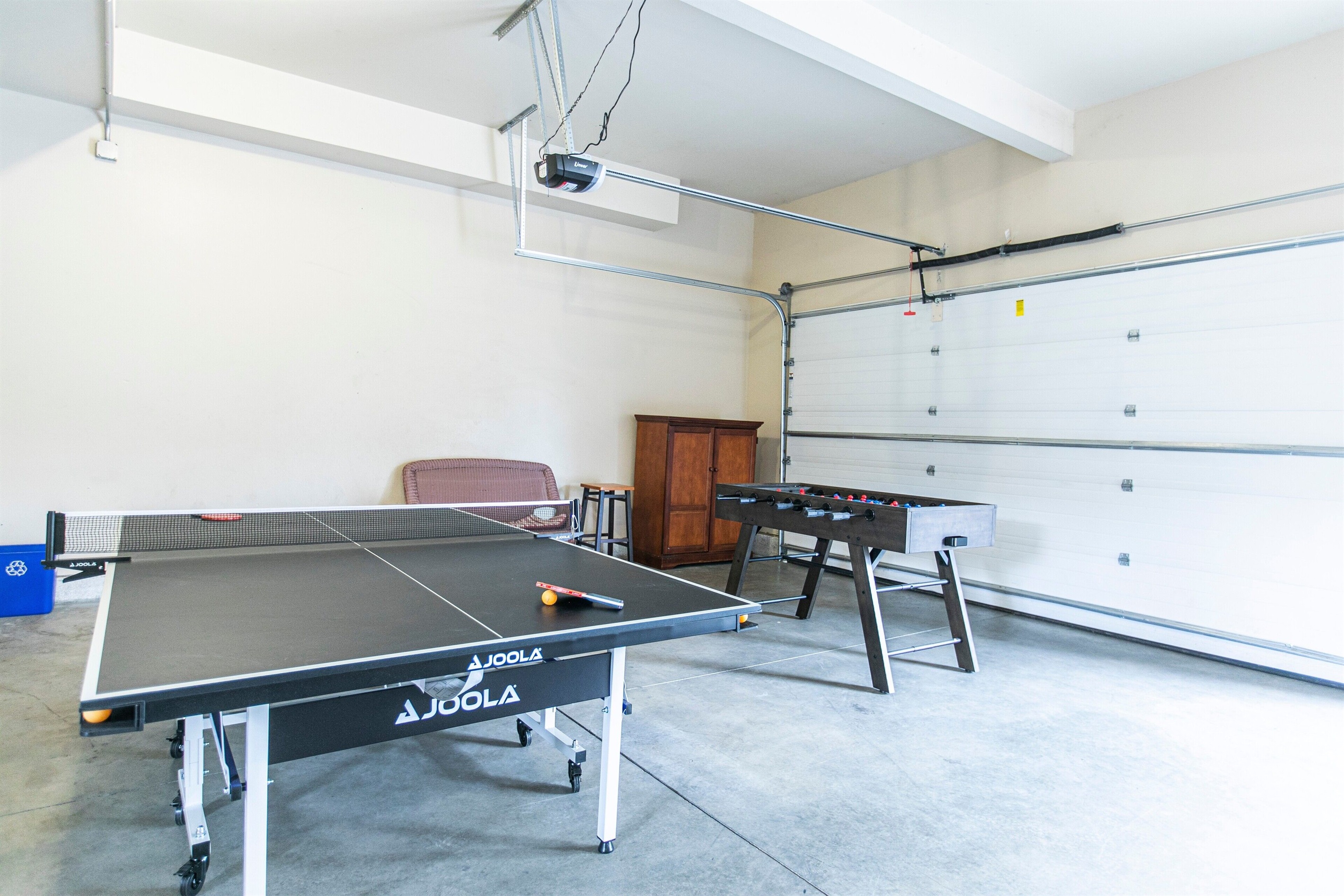 Game area with ping-pong, foosball and space to play - fun for all ages!