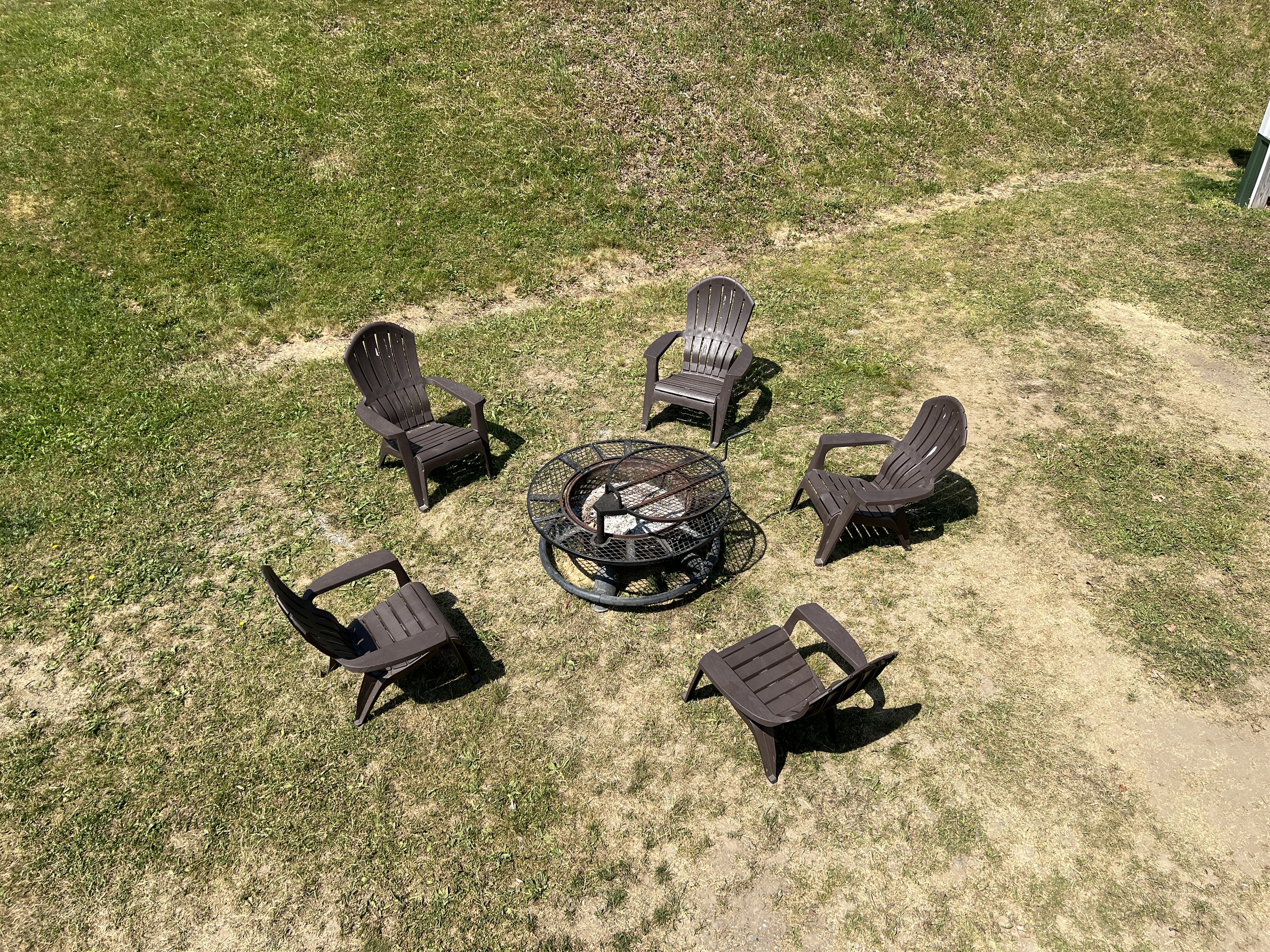 Roundtripper view of the firepit below private balcony.