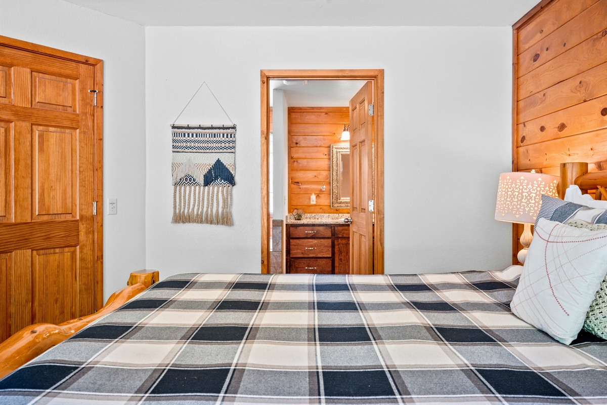 Direct access to Bathroom 1 and hallway from this private bedroom.