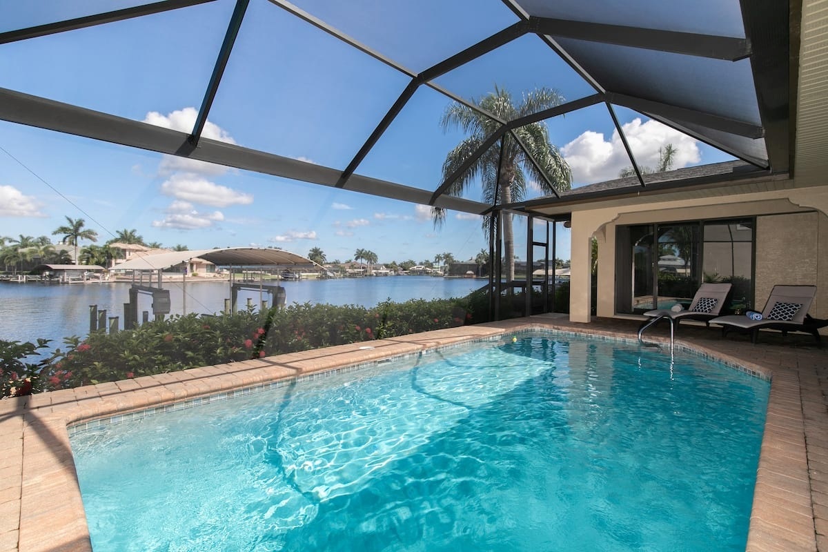 Relax in the screened-in lanai, complete with a heated pool for year-round enjoyment.