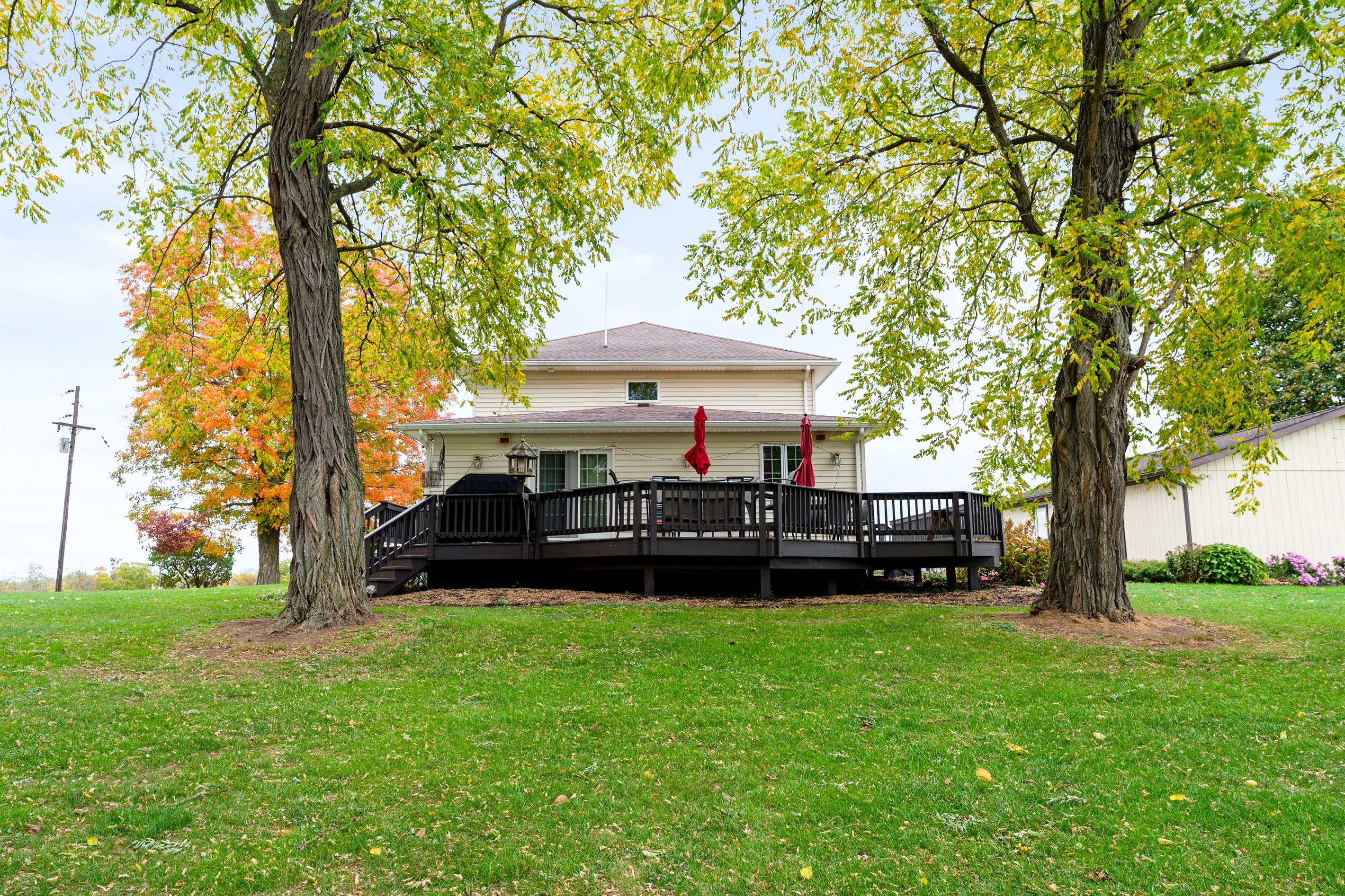 Expansive yard and spacious deck — perfect for outdoor dining, lounging, or soaking in the view!