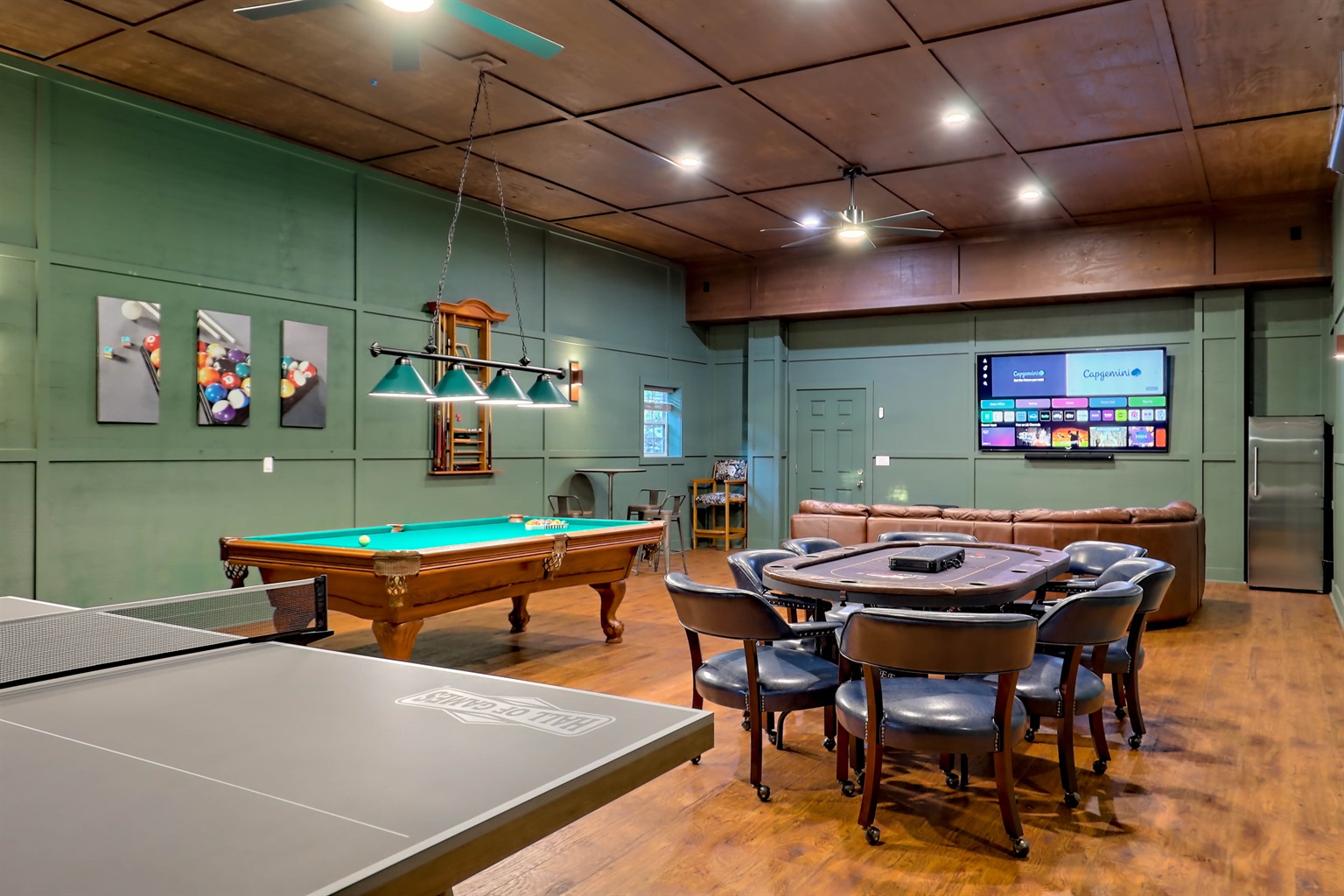 Your group’s favorite hangout: a fully equipped game room with pool table, poker table, ping pong, and a 75-inch smart TV.