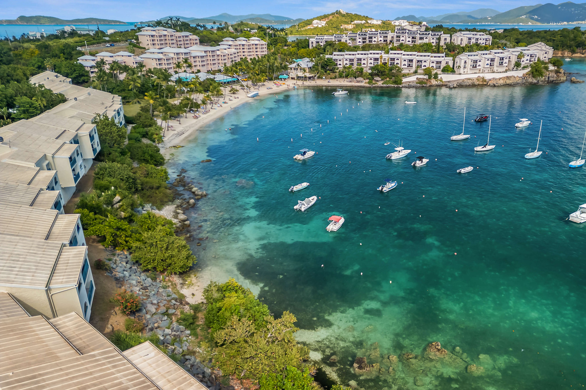From above, the beauty of Cowpet Bay and its vibrant blue waters is unforgettable.