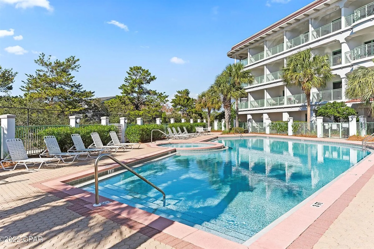 Unwind and rejuvenate with our private pool and hot tub, conveniently located just outside your door.  Spend your days relaxing by the pool, reading a book, or exploring the beautiful beach.