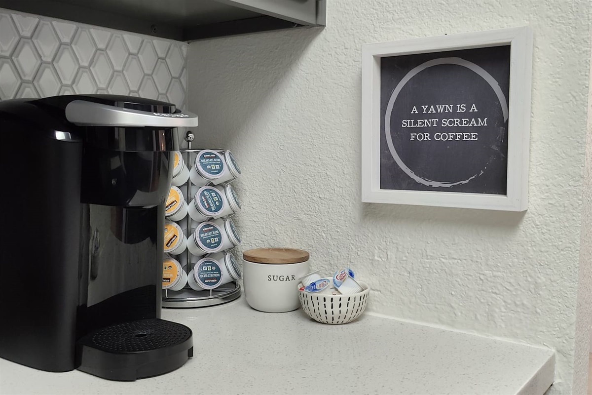 Coffee bar with a variety of drinks, sugars, and creamers to choose from to get your day started!