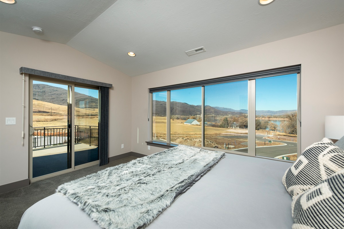 Wake up to lake views with direct access to the deck.