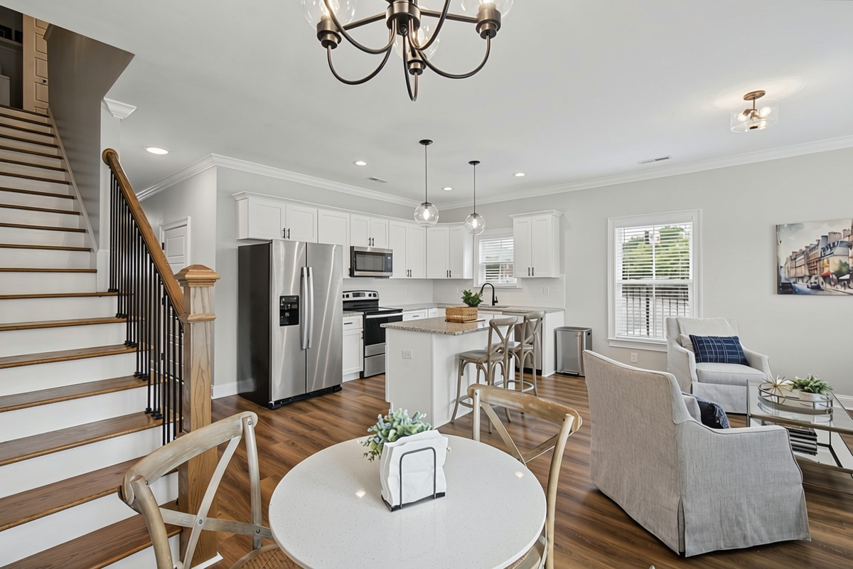 Open-concept main level where living, dining, and kitchen all flow together