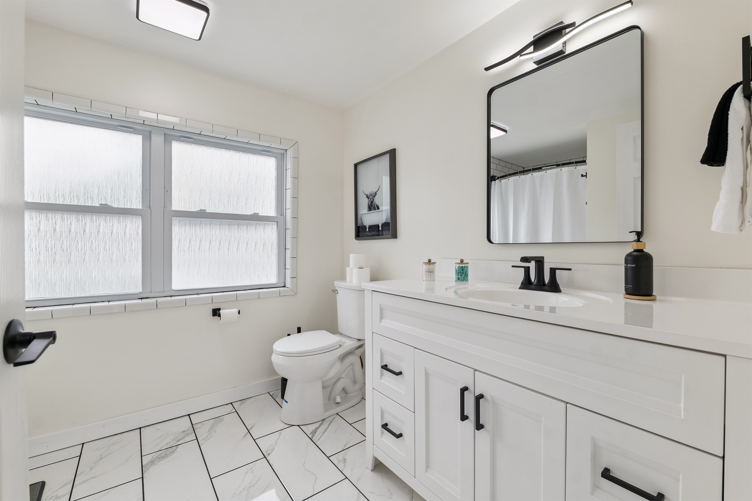 Full bathroom, brand new and fresh with shower