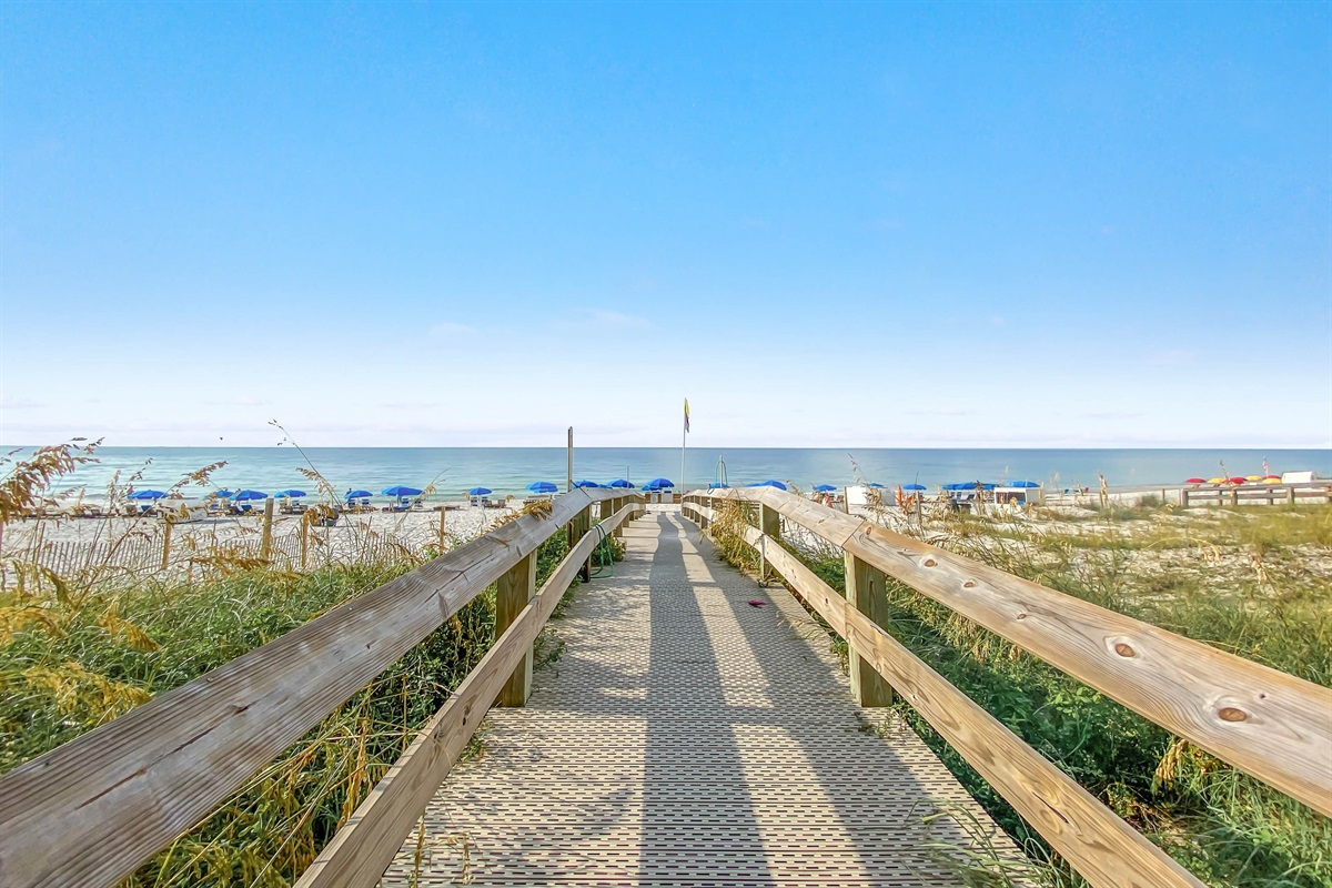Private boardwalk access to Orange Beach. Enjoy stunning Gulf views and immediate beach entry at this premier Phoenix West vacation rental.