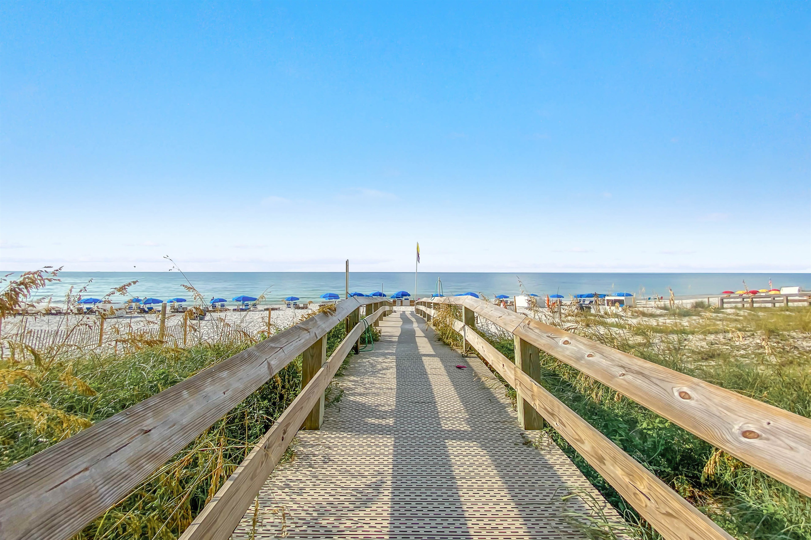 Private boardwalk access to Orange Beach. Enjoy stunning Gulf views and immediate beach entry at this premier Phoenix West vacation rental.