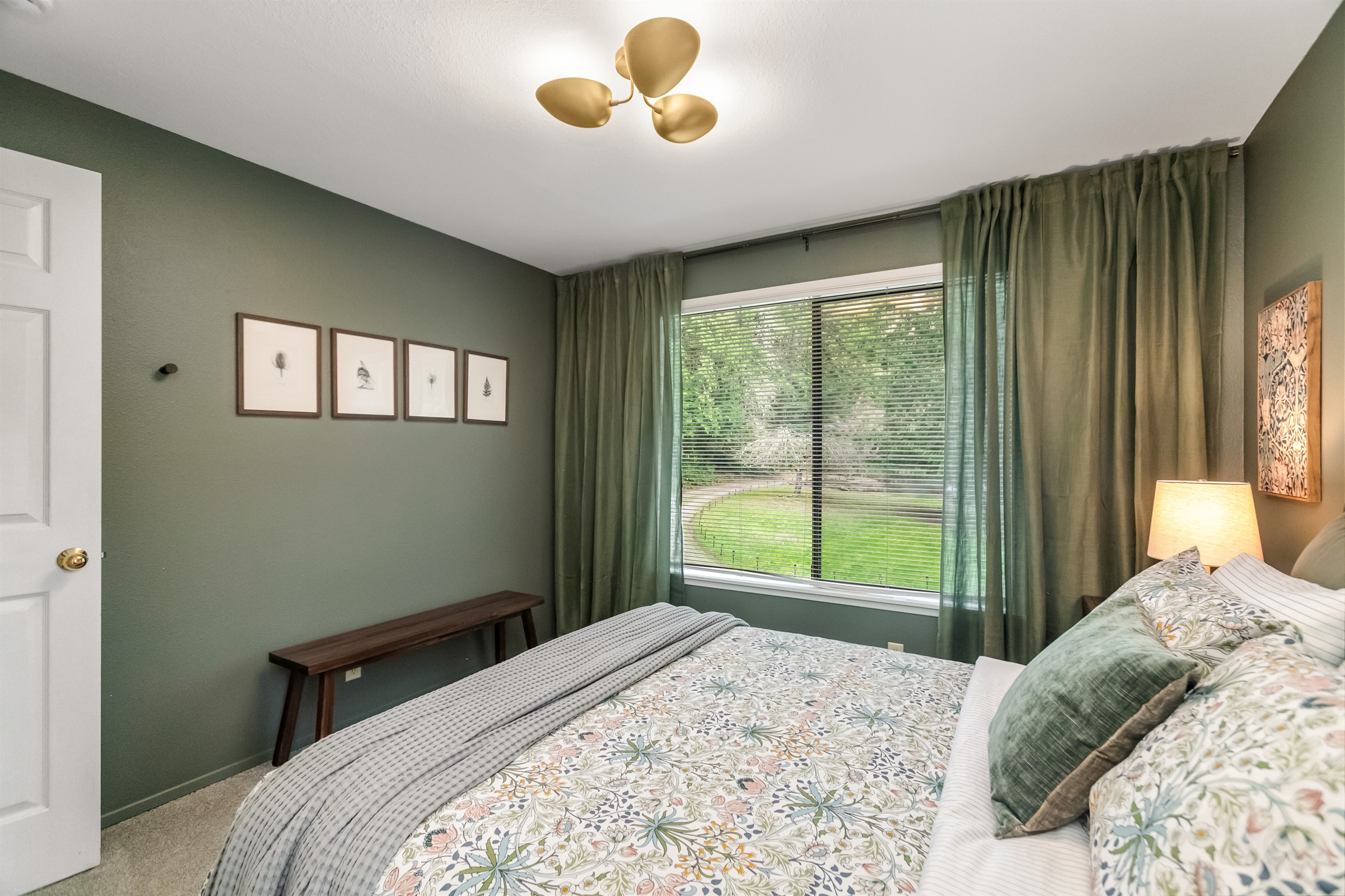 The tree land property lets you soak in nature from every room.